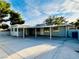 Spacious backyard with covered patio, offering ample space for parking and outdoor activities at 700 N Minnesota St, Las Vegas, NV 89107