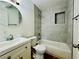 Modern bathroom featuring a tub with tiled wall and built-in niche at 700 N Minnesota St, Las Vegas, NV 89107