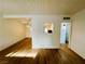 Spacious living room featuring hardwood floors and bright, white walls at 700 N Minnesota St, Las Vegas, NV 89107