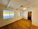 Open living room with hardwood floors and natural light at 700 N Minnesota St, Las Vegas, NV 89107