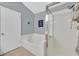 Bathroom showcasing a soaking tub, and separate shower with nautical decor at 701 Wheat Ridge Ln # 203, Las Vegas, NV 89145