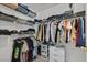 Well-organized closet with shelving and hanging racks at 701 Wheat Ridge Ln # 203, Las Vegas, NV 89145