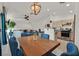 Open-concept floor plan with dining area, kitchen, and living room at 701 Wheat Ridge Ln # 203, Las Vegas, NV 89145