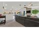 Spacious living area featuring a fireplace, flat-screen TV, and an open floor plan at 701 Wheat Ridge Ln # 203, Las Vegas, NV 89145