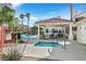 Inviting community pool area boasts a covered pavilion, spa, and lounge chairs for relaxation at 701 Wheat Ridge Ln # 203, Las Vegas, NV 89145