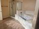Bathroom featuring a shower stall, a jacuzzi tub, and tile floors at 7020 King Solomons Ct, Las Vegas, NV 89117