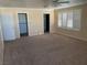 Bedroom features neutral carpet, ceiling fan and bright window shutters at 7020 King Solomons Ct, Las Vegas, NV 89117