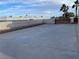 Large concrete driveway with brick accents and metal gates at 7020 King Solomons Ct, Las Vegas, NV 89117