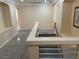 Upstairs hallway with carpet and neutral walls featuring modern railings at 7020 King Solomons Ct, Las Vegas, NV 89117