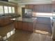 Spacious kitchen with a large island, stainless steel appliances, and granite countertops at 7020 King Solomons Ct, Las Vegas, NV 89117