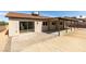 Backyard view featuring a covered patio and sliding glass door at 706 Greenway Rd, Henderson, NV 89002