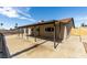 Backyard view with covered patio and exterior of home at 706 Greenway Rd, Henderson, NV 89002