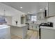 This spacious kitchen boasts an island, modern appliances, and gray cabinets at 706 Greenway Rd, Henderson, NV 89002
