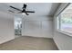 Main bedroom with carpet, ceiling fan, closet, and en suite bath at 706 Greenway Rd, Henderson, NV 89002