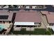 Aerial view showcasing the property's tile roof, covered patio, backyard, and neighborhood at 7228 Fern Meadow St, Las Vegas, NV 89149