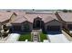 Aerial front view of home with well-manicured lawn and a two-car garage at 7228 Fern Meadow St, Las Vegas, NV 89149