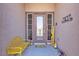 Inviting front entrance with decorative door, sidelights, a sunflower mat and 'welcome' sign at 7228 Fern Meadow St, Las Vegas, NV 89149