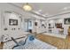 Bright and airy living room with hardwood floors, decorative columns, and an open layout at 7228 Fern Meadow St, Las Vegas, NV 89149