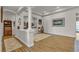 Spacious living room featuring hardwood floors, columns, and ample natural light at 7228 Fern Meadow St, Las Vegas, NV 89149