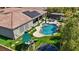 Resort style backyard with pool, playground and hot tub with beautiful desert landscaping at 7289 Sea Anchor Ct, Las Vegas, NV 89131