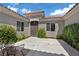 Private courtyard with stylish decor, string lights, and lush landscaping at 7289 Sea Anchor Ct, Las Vegas, NV 89131
