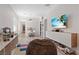 Spacious Gathering room with a large TV, a beanbag, and hardwood floors at 7289 Sea Anchor Ct, Las Vegas, NV 89131