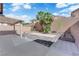 Backyard featuring desert landscaping and a covered patio area at 7300 Lavender Rose Ave, Las Vegas, NV 89117