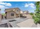 Backyard view with covered patio area and privacy wall at 7300 Lavender Rose Ave, Las Vegas, NV 89117