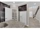 A well-equipped kitchen showcases modern appliances and a convenient pantry for ample storage at 7300 Lavender Rose Ave, Las Vegas, NV 89117