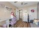 Bright bedroom features a desk, neutral walls and an abundance of natural light at 779 Peregrine Falcon St, Henderson, NV 89015