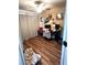 Bedroom space with wood-look flooring and ample natural light at 779 Peregrine Falcon St, Henderson, NV 89015