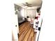 Functional bedroom featuring wood-look flooring and neutral color palette at 779 Peregrine Falcon St, Henderson, NV 89015