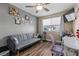 Cozy bedroom space bathed in natural light and neutral tones at 779 Peregrine Falcon St, Henderson, NV 89015