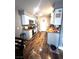 Efficient kitchen featuring butcherblock countertops, stainless steel appliances, and wood-look flooring at 779 Peregrine Falcon St, Henderson, NV 89015