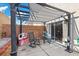 Covered patio with rocking chairs, perfect for relaxation and outdoor entertainment at 779 Peregrine Falcon St, Henderson, NV 89015