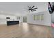 Living room view showcasing modern decor and open layout into kitchen area at 8043 Tank Loop St, Las Vegas, NV 89166