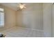 Neutral bedroom with ceiling fan and shuttered window at 8105 Tropic Isle Cir, Las Vegas, NV 89128