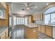 An airy kitchen features a center island, modern appliances, and an adjoining breakfast nook at 8105 Tropic Isle Cir, Las Vegas, NV 89128