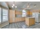 Spacious kitchen featuring an island, plentiful cabinetry, and modern appliances at 8105 Tropic Isle Cir, Las Vegas, NV 89128