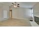 Bright living room features wood flooring, fireplace, and access to other rooms at 8105 Tropic Isle Cir, Las Vegas, NV 89128