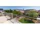 Elevated backyard view featuring a manicured yard with a fire pit and neighborhood views at 8108 Artistic Heights Ct, Las Vegas, NV 89143
