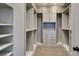 Custom walk-in closet offers ample storage with built-in shelving and drawer units at 8108 Artistic Heights Ct, Las Vegas, NV 89143