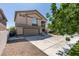 Beautiful two-story home featuring a neutral color scheme, two car garage and a well-maintained yard at 8108 Artistic Heights Ct, Las Vegas, NV 89143