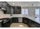 Contemporary kitchen with stainless appliances, modern fixtures, gray cabinetry, and sleek design at 8108 Artistic Heights Ct, Las Vegas, NV 89143