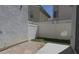 A cozy backyard with a mix of rock landscaping, artificial turf, and a white lattice fence at 8218 Golden Flowers St, Las Vegas, NV 89139