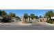View of the gated entrance to a well maintained and landscaped community at 8218 Golden Flowers St, Las Vegas, NV 89139