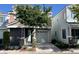 Contemporary two-story home featuring a two-car garage, stone accents, and a well-maintained front yard at 8218 Golden Flowers St, Las Vegas, NV 89139