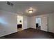 Spacious loft area with neutral carpet, natural light, and access to a bathroom at 8218 Golden Flowers St, Las Vegas, NV 89139