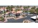 Aerial view of a community showcasing lush landscaping, a pool, and convenient parking at 8600 W Charleston Blvd # 2068, Las Vegas, NV 89117
