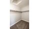 Spacious closet with plush carpet and multiple rows of shelving to organize and maximize storage at 8600 W Charleston Blvd # 2068, Las Vegas, NV 89117